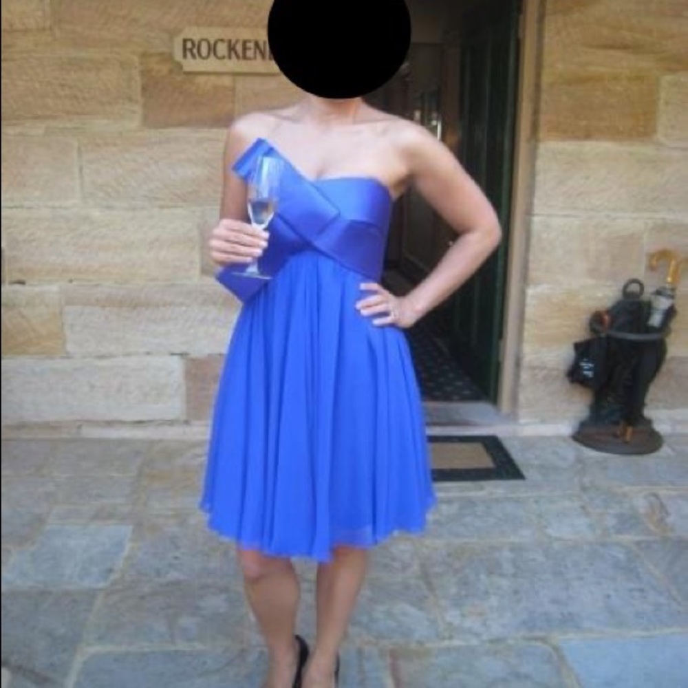 Purple strapless cocktail bow dress